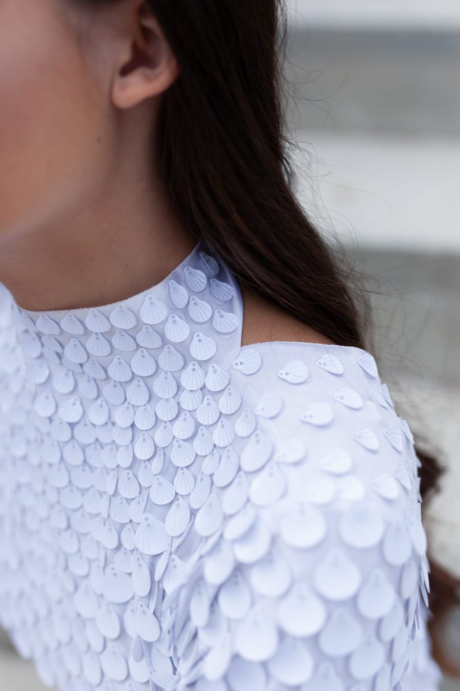 White shell sequin festival dress with a built-in bodysuit, featuring a flattering silhouette and soft sparkle that catches the light from every angle.