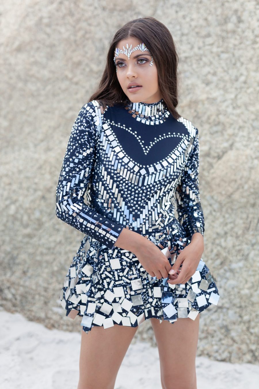 ilver and black long-sleeved sequin festival dress with a built-in bodysuit, featuring shimmering sequins and a comfortable, flattering fit