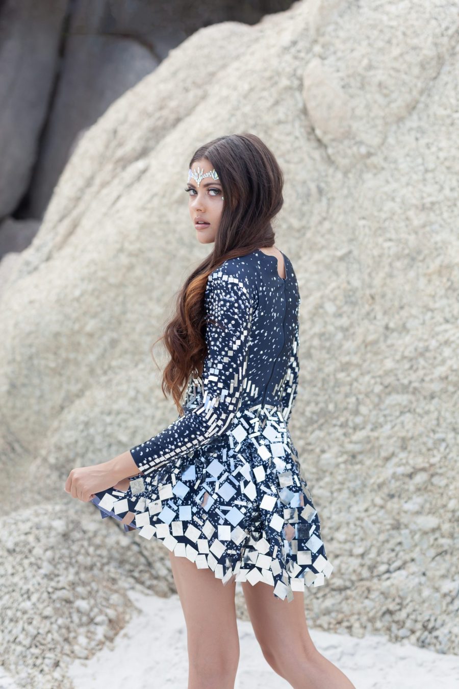 ilver and black long-sleeved sequin festival dress with a built-in bodysuit, featuring shimmering sequins and a comfortable, flattering fit