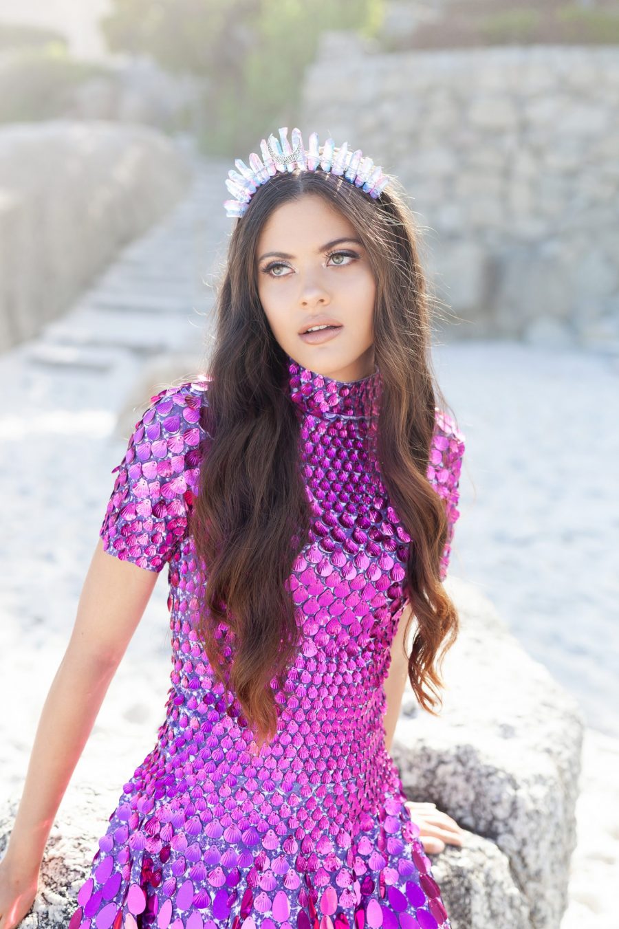 Fuchsia festival dress covered in shimmering shell-shaped sequins, featuring a sleek, mermaid-inspired silhouette and built-in bodysuit for a comfortable, flattering fit.