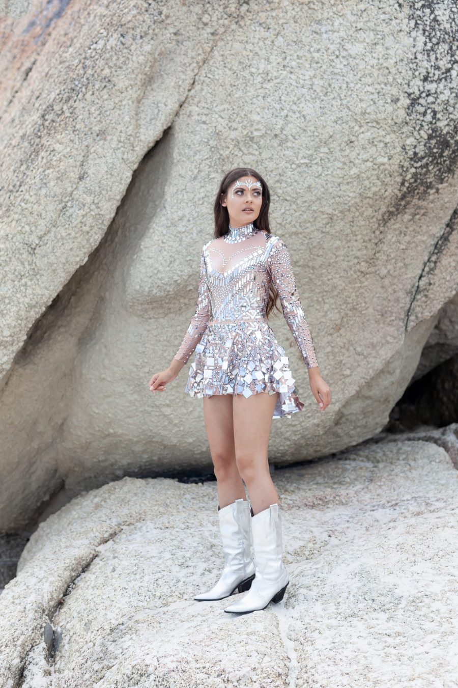 Silver and nude long-sleeved sequin festival dress with a built-in bodysuit, featuring shimmering sequins and a sleek, comfortable fit.