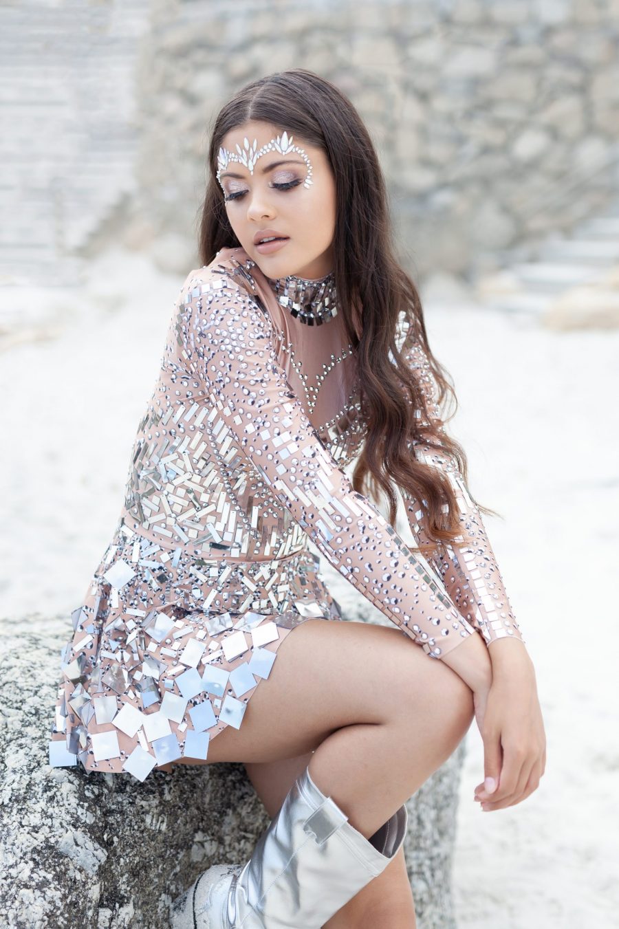 Silver and nude long-sleeved sequin festival dress with a built-in bodysuit, featuring shimmering sequins and a sleek, comfortable fit.